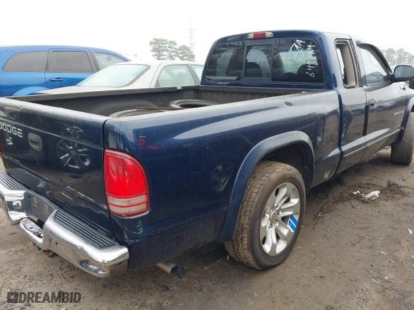 2002 Dodge Dakota SLT with VIN 1B7GL42X72S649714, listed as a IAAI auction lot 41426396 with 227,056 mi miles. Bid and sale history available at carsss.com. Image 4.
