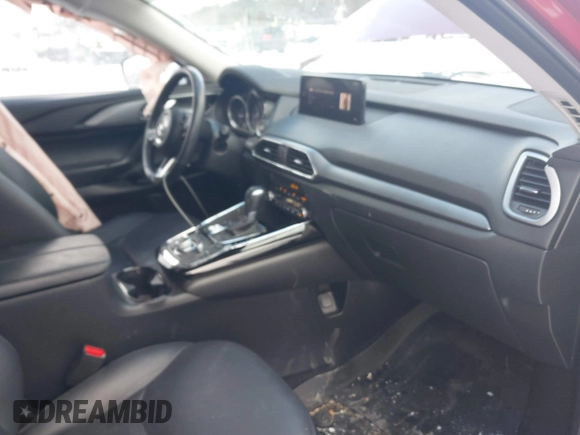 2022 Mazda CX-9 Touring Plus z VIN JM3TCBAY0N0619152, wystawiony jako IAAI lot #41489705 z przebiegiem 18 664 mil mil oraz . Historia ofert i sprzedaży dostępna na DreamBid. Obrazek 5.