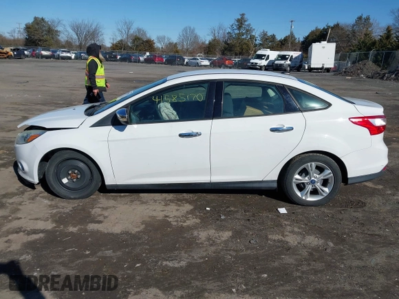 2014 Ford Focus SE with VIN 1FADP3F21EL119923, listed as a IAAI auction lot 41585170 with 126,266 mi miles. Bid and sale history available at carsss.com. Image 15.