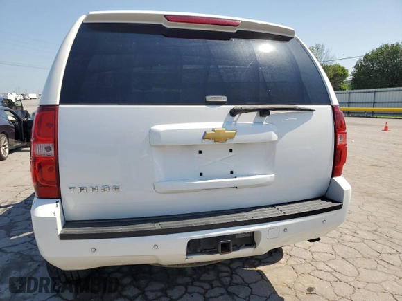 2013 Chevrolet Tahoe LT с VIN 1GNSCBE01DR158327, выставлен на аукционе Copart как лот 61760895 с пробегом 228 070 миль миль и Списание • Salvage title. История ставок и продаж доступна на DreamBid. Изображение 6.