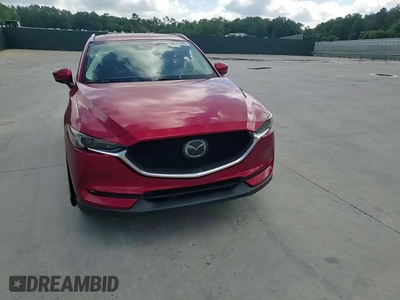 2019 Mazda CX-5 Grand Touring with VIN JM3KFADM2K1657915, listed as a Copart auction lot 56647145 with 85,095 mi miles and Salvage title. Bid and sale history available at DreamBid. Image 14.