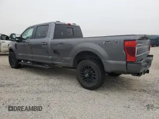 2021 Ford F-350 XL with VIN 1FT8W3BT0MEE06413, listed as a Copart auction lot 42080395 with 140,610 mi miles and Salvage title. Bid and sale history available at DreamBid. Image 2.