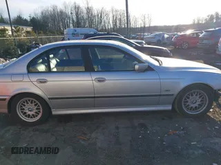 1999 BMW 5 Series 528iA with VIN WBADM6336XBY31254, listed as a IAAI auction lot 41408089 with 221,176 mi miles. Bid and sale history available at carsss.com. Image 14.