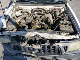 2001 Toyota Tacoma z VIN 5TENL42N71Z786121, wystawiony jako Copart lot #59601225 z przebiegiem 194 609 mil mil oraz Szkoda całkowita • Salvage title. Historia ofert i sprzedaży dostępna na DreamBid. Obrazek 11.