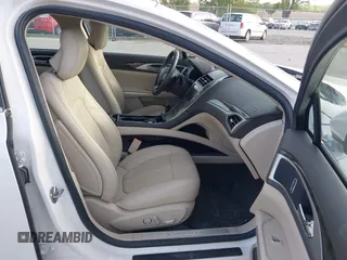 2016 Lincoln MKZ with VIN 3LN6L2JK0GR627283, listed as a IAAI auction lot 42271206 with 52,890 mi miles and . Bid and sale history available at DreamBid. Image 5.