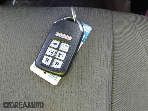 2020 Honda Odyssey EX with VIN 5FNRL6H59LB068868, listed as a IAAI auction lot 41930832 with 64,872 mi miles and . Bid and sale history available at DreamBid. Image 11.