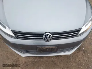 2014 Volkswagen Jetta Sedan SE w/Connectivity with VIN 3VWD17AJ2EM217534, listed as a IAAI auction lot 41872938 with 99,764 mi miles. Bid and sale history available at carsss.com. Image 6.