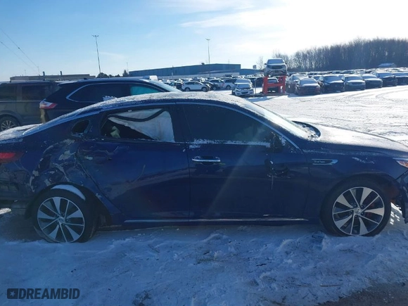 2016 Kia Optima SXL Turbo with VIN 5XXGV4L2XGG014565, listed as a IAAI auction lot 41213545 with 112,166 mi miles. Bid and sale history available at carsss.com. Image 14.