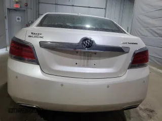 2012 Buick LaCrosse Premium 1 z VIN 1G4GD5E33CF158512, wystawiony jako Copart lot #58360135 z przebiegiem 215 782 mil mil oraz Szkoda całkowita • Salvage title. Historia ofert i sprzedaży dostępna na DreamBid. Obrazek 6.