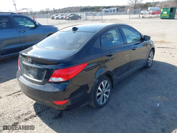 2017 Hyundai Accent SE with VIN KMHCT4AE1HU386384, listed as a IAAI auction lot 41656299 with 121,336 mi miles. Bid and sale history available at carsss.com. Image 4.