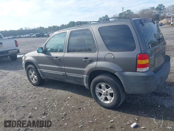 2006 Ford Escape XLT with VIN 1FMYU03Z56KC55074, listed as a IAAI auction lot 41473454 with 164,399 mi miles. Bid and sale history available at carsss.com. Image 3.