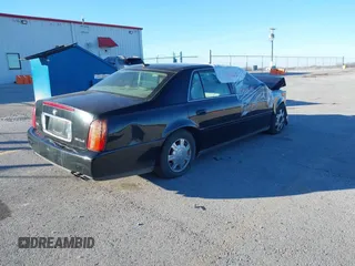 2005 Cadillac DeVille with VIN 1G6KD54Y05U152924, listed as a IAAI auction lot 41025529 with 1 mi miles. Bid and sale history available at carsss.com. Image 4.
