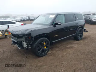 2024 Rivian R1S Adventure with VIN 7PDSGABA1RN035557, listed as a IAAI auction lot 41170478 with 5,210 mi miles. Bid and sale history available at carsss.com. Image 20.
