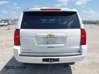 2015 Chevrolet Tahoe LS z VIN 1GNSCAKC6FR239156, wystawiony jako IAAI lot #42545513 z przebiegiem 117 863 mil mil oraz . Historia ofert i sprzedaży dostępna na DreamBid. Obrazek 16.