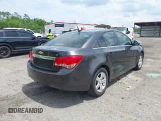 2014 Chevrolet Cruze 1LT z VIN 1G1PC5SBXE7178264, wystawiony jako IAAI lot #42387875 z przebiegiem 125 437 mil mil oraz . Historia ofert i sprzedaży dostępna na DreamBid. Obrazek 4.