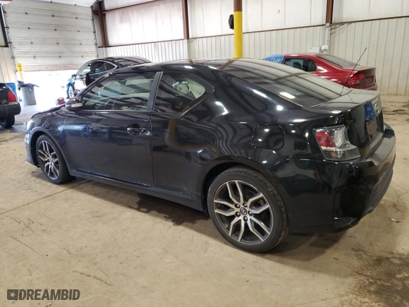 2014 Scion tC with VIN JTKJF5C76E3073381, listed as a Copart auction lot 51405565 with 165,000 mi miles and Salvage Title. Bid and sale history available at carsss.com. Image 2.