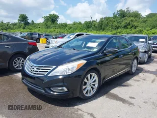 2013 Hyundai Azera z VIN KMHFH4JG0DA310957, wystawiony jako IAAI lot #42451780 z przebiegiem 82 827 mil mil oraz . Historia ofert i sprzedaży dostępna na DreamBid. Obrazek 17.