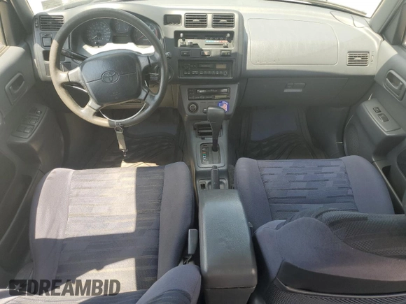 1997 Toyota RAV4 with VIN JT3HP10V3V7059398, listed as a Copart auction lot 54709995 with 186,467 mi miles and Salvage title. Bid and sale history available at DreamBid. Image 8.