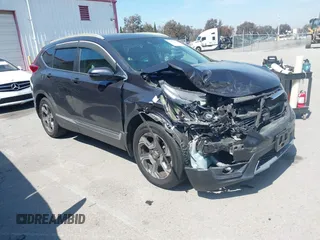 2019 Honda CR-V EX with VIN 5J6RW1H5XKA044056, listed as a IAAI auction lot 41856217 with 92,552 mi miles. Bid and sale history available at carsss.com. Image 1.