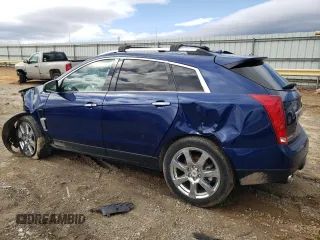 2012 Cadillac SRX Performance Collection with VIN 3GYFNEE36CS655976, listed as a Copart auction lot 47621475 with 144,835 mi miles and Salvage title. Bid and sale history available at DreamBid. Image 2.