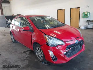 2015 Toyota Prius c One with VIN JTDKDTB3XF1108456, listed as a IAAI auction lot 41743379 with 132,265 mi miles. Bid and sale history available at carsss.com. Image 1.