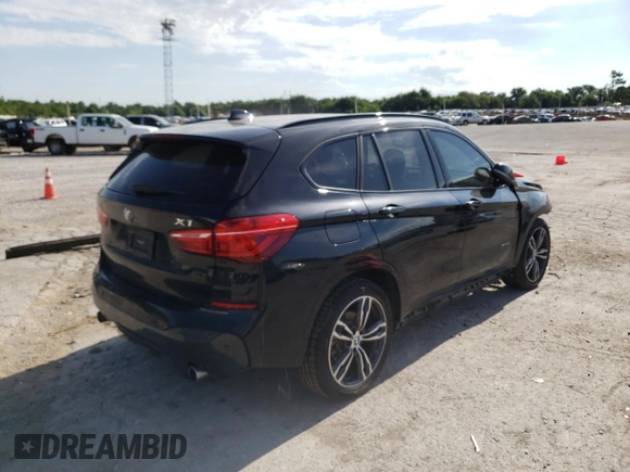 2018 BMW X1 sDrive28i with VIN WBXHU7C35J5H40837, listed as a Copart auction lot 52343122 with 61,458 mi miles. Bid and sale history available at carsss.com. Image 4.