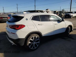 2020 BMW X2 xDrive28i with VIN WBXYJ1C02L5P85780, listed as a Copart auction lot 81761284 with 14,451 mi miles and Salvage Title. Bid and sale history available at carsss.com. Image 3.