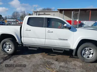 2023 Toyota Tacoma 4WD SR with VIN 3TMCZ5AN1PM538367, listed as a IAAI auction lot 41468684 with 28,879 mi miles. Bid and sale history available at carsss.com. Image 13.