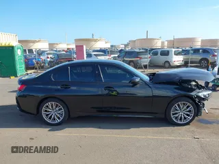 2023 BMW 3 Series 330i with VIN 3MW69FF06P8D71252, listed as a IAAI auction lot 41916329 with 302 mi miles. Bid and sale history available at carsss.com. Image 14.