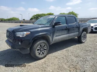 2022 Toyota Tacoma SR with VIN 3TMCZ5AN2NM490701, listed as a Copart auction lot 57434395 with 16,765 mi miles and Salvage title. Bid and sale history available at DreamBid. Image 1.