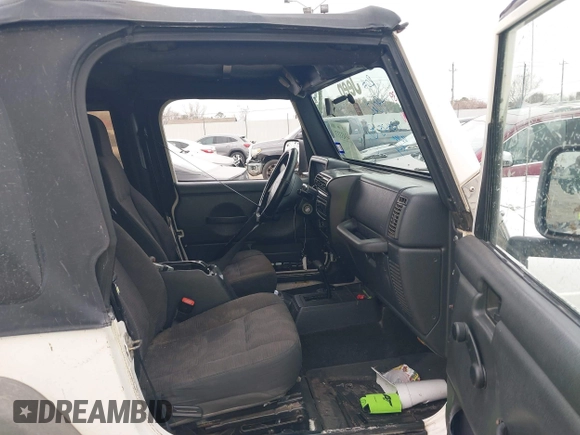 2005 Jeep Wrangler Sport with VIN 1J4FA49S25P320240, listed as a IAAI auction lot 41433371 with 144,552 mi miles. Bid and sale history available at carsss.com. Image 5.