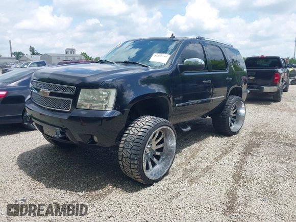 2007 Chevrolet Tahoe LT z VIN 1GNFK13067R331734, wystawiony jako IAAI lot #42372797 z przebiegiem 173 150 mil mil oraz . Historia ofert i sprzedaży dostępna na DreamBid. Obrazek 19.