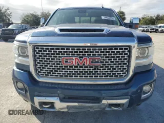 2017 GMC Sierra 3500HD Denali z VIN 1GT42YEY6HF158831, wystawiony jako Copart lot #74659734 z przebiegiem Nie podano mil oraz Nie do naprawy • Non repairable. Historia ofert i sprzedaży dostępna na DreamBid. Obrazek 5.