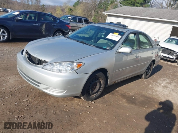 2004 Toyota Camry LE with VIN 4T1BE32K64U282875, listed as a IAAI auction lot 42038006 with 238,605 mi miles. Bid and sale history available at carsss.com. Image 18.