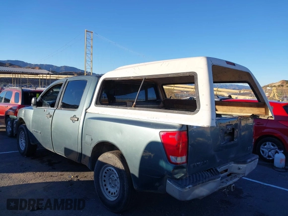 2005 Nissan Titan SE with VIN 1N6AA07A35N540675, listed as a IAAI auction lot 41263861 with 217,785 mi miles and . Bid and sale history available at DreamBid. Image 3.