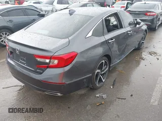 2018 Honda Accord Touring with VIN 1HGCV1F92JA005210, listed as a IAAI auction lot 42378040 with 69,294 mi miles and . Bid and sale history available at DreamBid. Image 4.