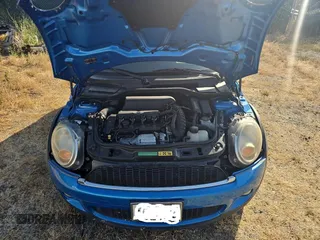 2009 MINI Hardtop S with VIN WMWMF73519TW86705, listed as a Copart auction lot 59819515 with 80,443 mi miles and Clean title. Bid and sale history available at DreamBid. Image 7.