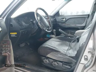 2004 Hyundai Sonata GLS with VIN KMHWF35H64A957365, listed as a IAAI auction lot 42150369 with 247,348 mi miles. Bid and sale history available at carsss.com. Image 5.