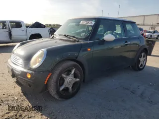 2004 MINI Hardtop with VIN WMWRC334X4TJ61391, listed as a Copart auction lot 53735615 with 103,974 mi miles and Salvage Title. Bid and sale history available at DreamBid. Image 1.