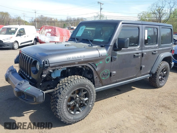 2021 Jeep Wrangler Unlimited Willys with VIN 1C4HJXDG1MW672507, listed as a IAAI auction lot 42084805 with 59,943 mi miles and . Bid and sale history available at DreamBid. Image 6.