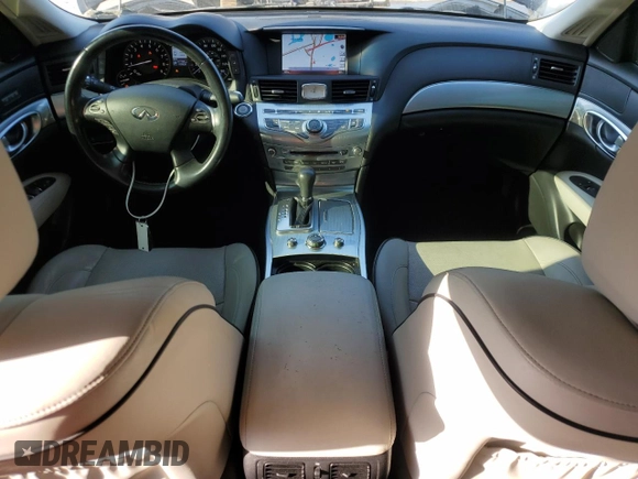 2016 Infiniti Q70 z VIN JN1BY1AP0GM220179, wystawiony jako Copart lot #54129215 z przebiegiem 117 759 mil mil oraz Szkoda całkowita • Salvage title. Historia ofert i sprzedaży dostępna na DreamBid. Obrazek 8.