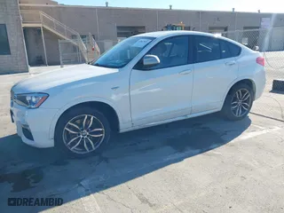 2017 BMW X4 M40i with VIN 5UXXW7C59H0U25191, listed as a IAAI auction lot 41867852 with 76,301 mi miles. Bid and sale history available at carsss.com. Image 17.