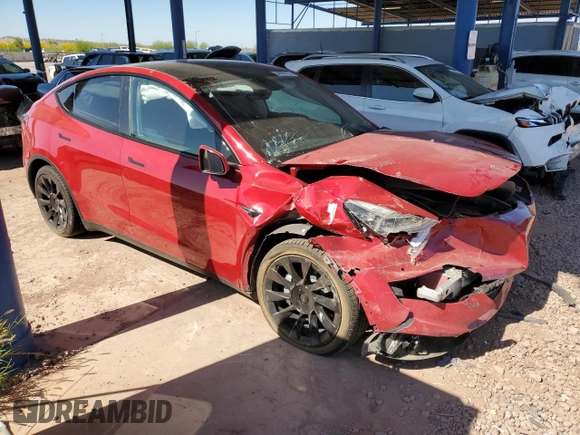 2022 Tesla Model Y Long Range z VIN 7SAYGDEE3NF436119, wystawiony jako Copart lot #54892115 z przebiegiem 27 054 mil mil oraz Szkody całkowita. Historia ofert i sprzedaży dostępna na DreamBid. Obrazek 4.