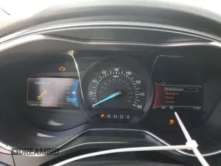 2016 Ford Fusion Titanium z VIN 3FA6P0D94GR181179, wystawiony jako Copart lot #56987005 z przebiegiem 79 841 mil mil oraz Czysty tytuł • Clean title. Historia ofert i sprzedaży dostępna na DreamBid. Obrazek 9.
