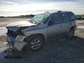 2002 GMC Envoy SLT with VIN 1GKDT13S122491329, listed as a Copart auction lot 75161714 with 149,659 mi miles and Salvage Title. Bid and sale history available at DreamBid. Image 1.