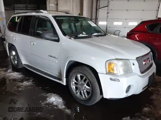 2006 GMC Envoy Denali with VIN 1GKET63M462161774, listed as a IAAI auction lot 41546976 with 144,729 mi miles. Bid and sale history available at carsss.com. Image 1.