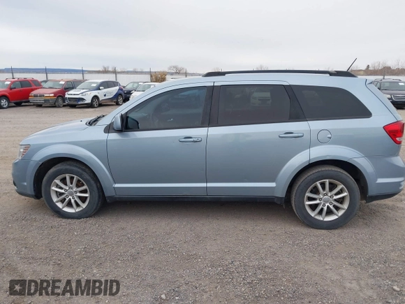 2013 Dodge Journey SXT with VIN 3C4PDDBG2DT724768, listed as a IAAI auction lot 40926457 with 150,862 mi miles and . Bid and sale history available at DreamBid. Image 14.