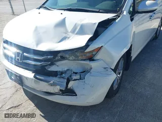 2016 Honda Odyssey EX-L with VIN 5FNRL5H65GB055916, listed as a IAAI auction lot 41980339 with 87,497 mi miles. Bid and sale history available at carsss.com. Image 6.