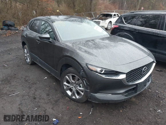 2021 Mazda CX-30 Select with VIN 3MVDMBBL2MM312752, listed as a IAAI auction lot 41933342 with 52,213 mi miles and . Bid and sale history available at DreamBid. Image 6.