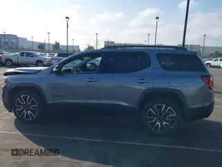 2021 GMC Acadia SLE with VIN 1GKKNKLA4MZ168921, listed as a IAAI auction lot 41562602 with 26,370 mi miles and . Bid and sale history available at DreamBid. Image 14.